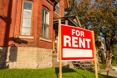 Real estate investor evaluating loan options for investment property financing