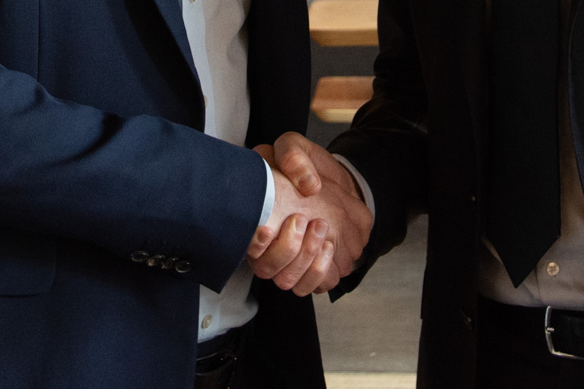 Investor weighing the pros and cons of blanket loan consolidation
