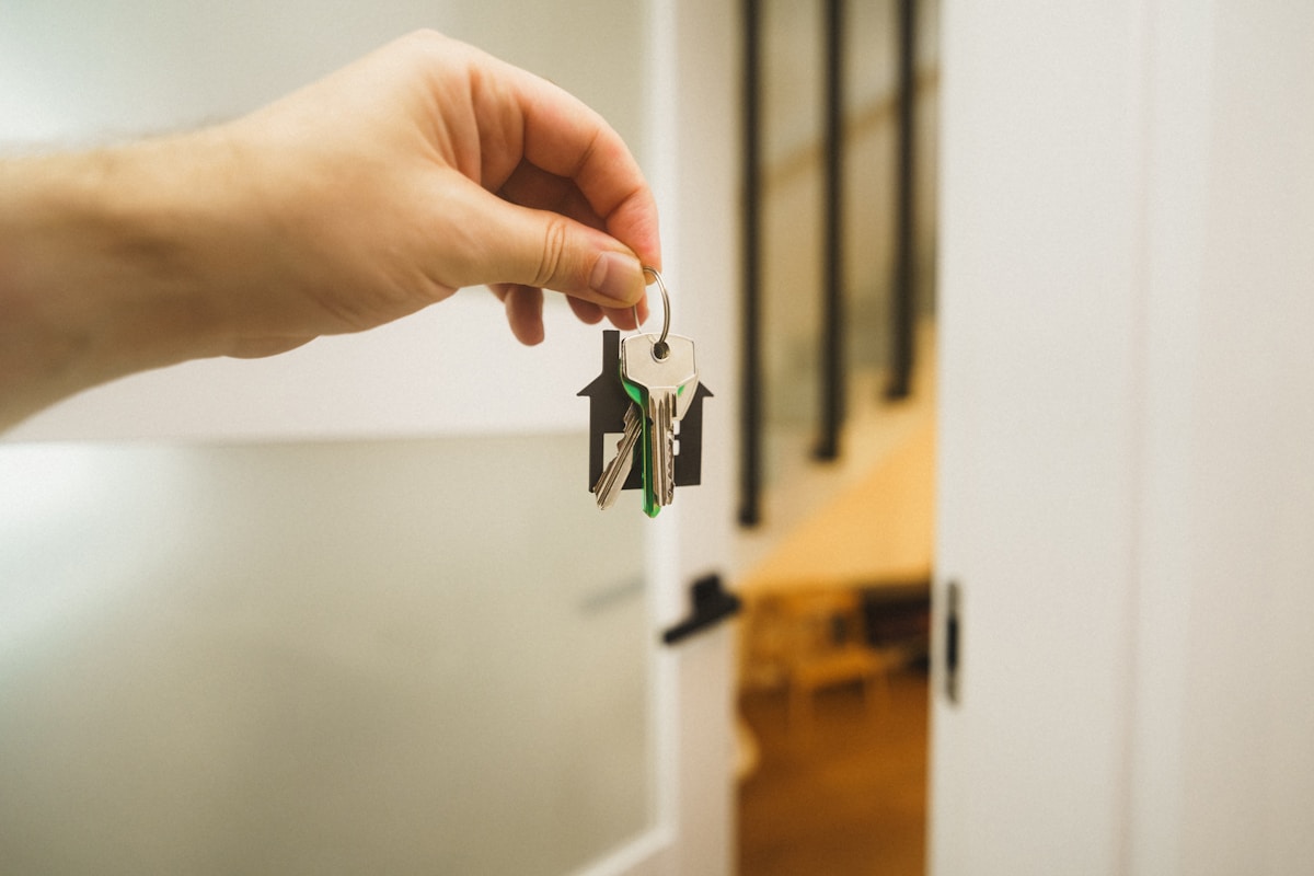 Investor analyzing rental property portfolio for blanket loan consolidation
