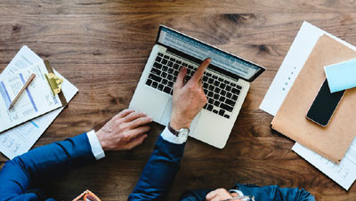 Investor researching blanket mortgage lenders
