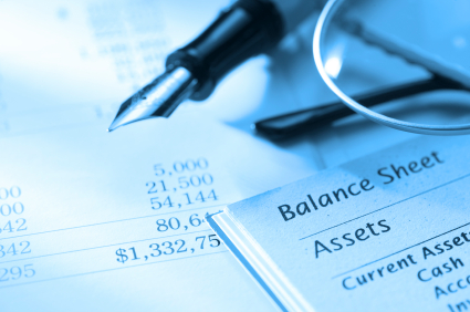 Investor evaluating business loan options for rental property acquisition