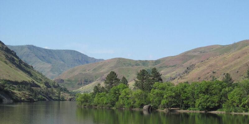 Deep river gorge of Hells Canyon with the Snake River flowing between Idaho and Oregon