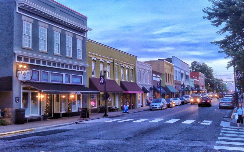 Apex, North Carolina historic downtown with charming storefronts and water tower