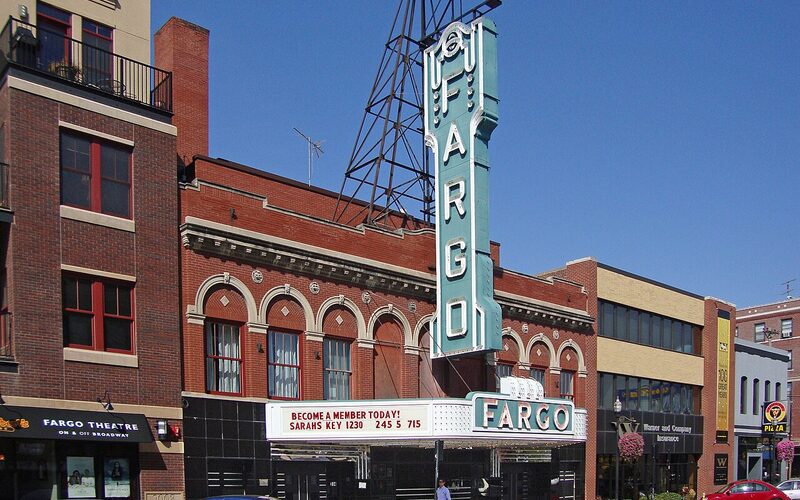 Historic Fargo Theatre marquee and Broadway entertainment district in downtown Fargo, North Dakota